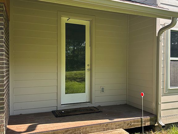 Entrance deck with room for chairs to watch wildlife, enjoy pond views, and relax.