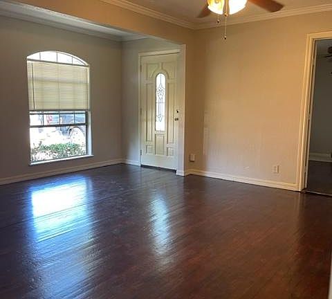 Large Living Room - newly stained floors and freshly painted walls and trim