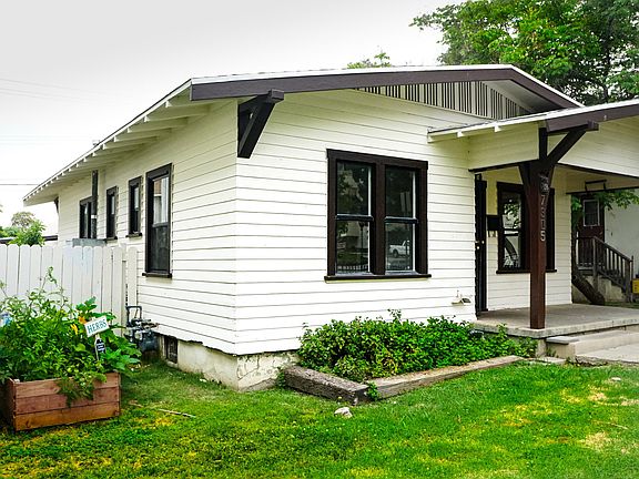 Gated Front Lawn w/Herb Garden