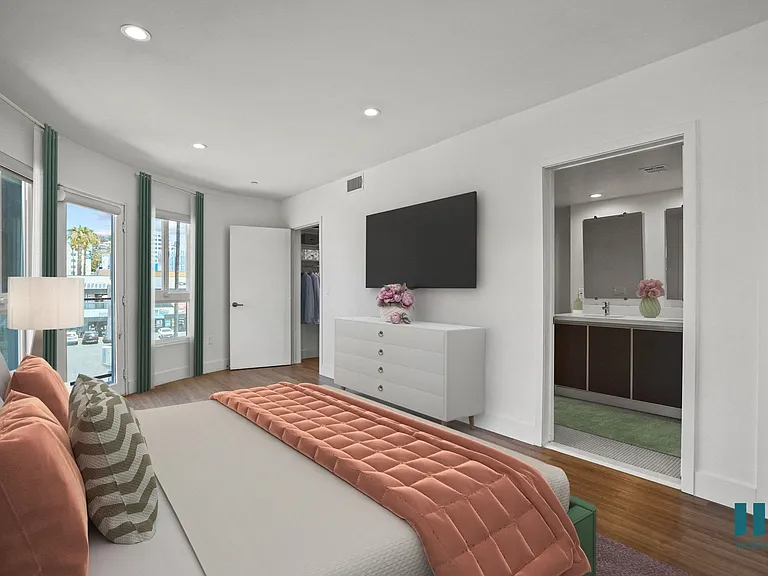 Bedroom with Walk-In Closet with Built-In Organizers, and Bathroom