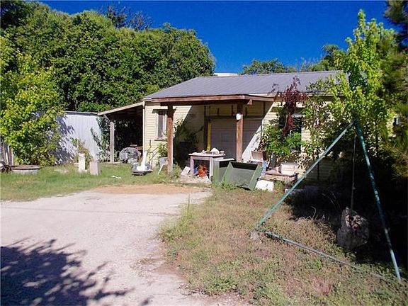 shed: 1200 sq ft warehouse on West side of lot