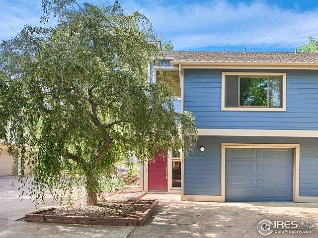 End unit with attached garage