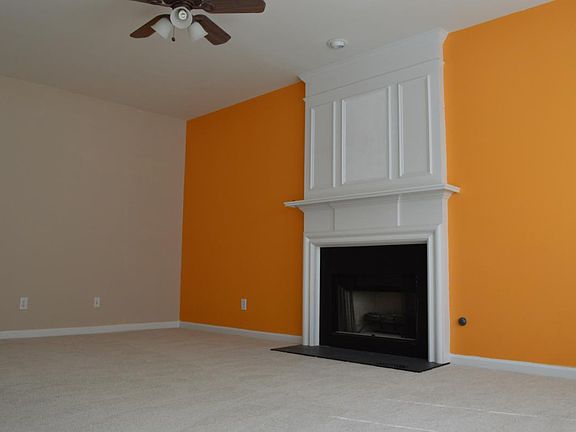 Family Room with Ceiling Fan/Fire Place