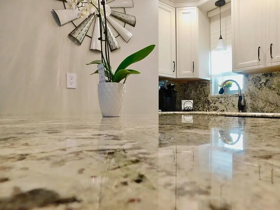 Island in kitchen with granite