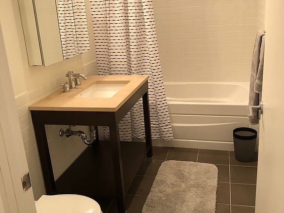 Full bathroom with tub