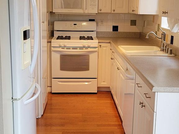 Kitchen includes refrigerator