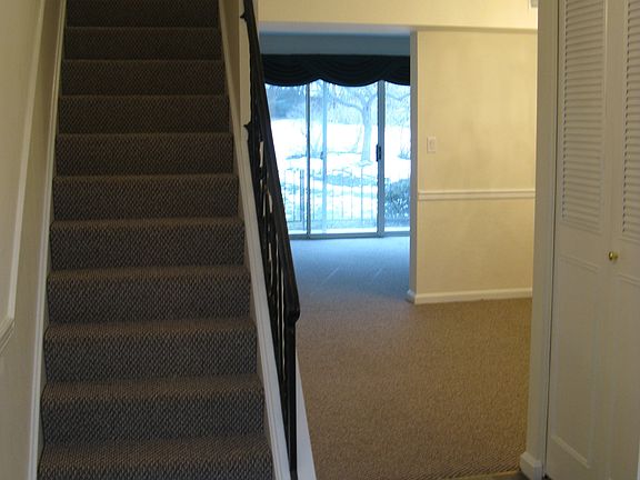 Original Slate Foyer with New Berber Carpeting Throughout