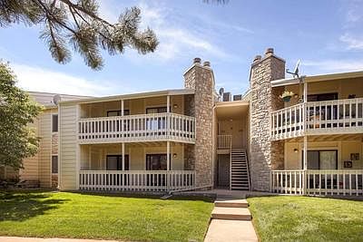 Bright lower unit with green space in front.