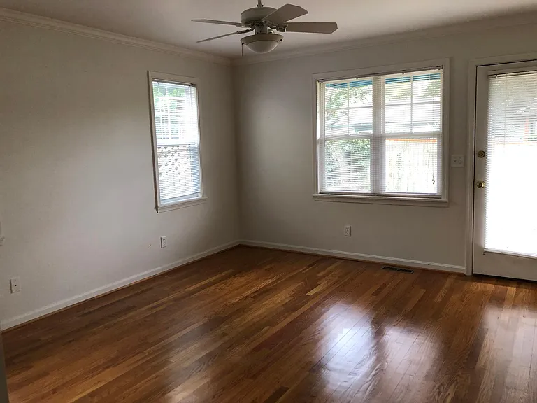 Master bedroom with door to the back deck.