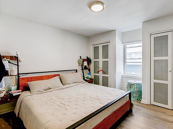 Large primary bedroom with 2 closets and on suite full bathroom