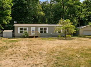 5778 Maple Hill Rd, Howard City, MI 49329