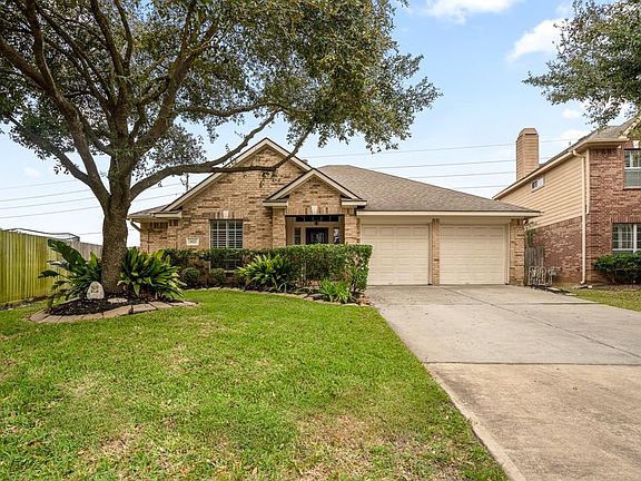 The front landscaping of the homes offers an adorable curb appeal with a beautiful mature tree that gives off plenty of shade! But don't worry, there are plantation shutters on the front windows as well that can easily be opened and closed to bring i