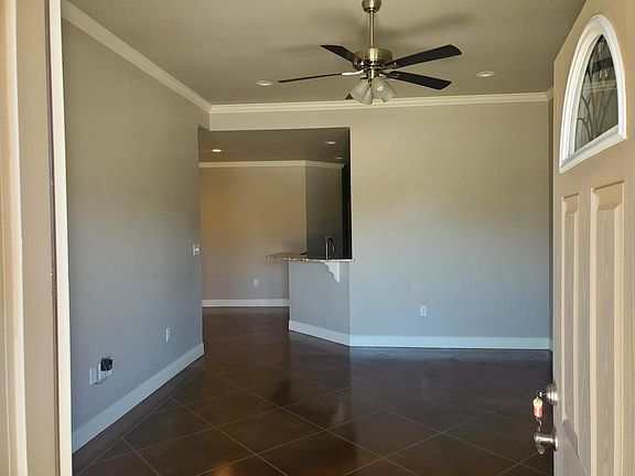 View walking in through front door. Living room.