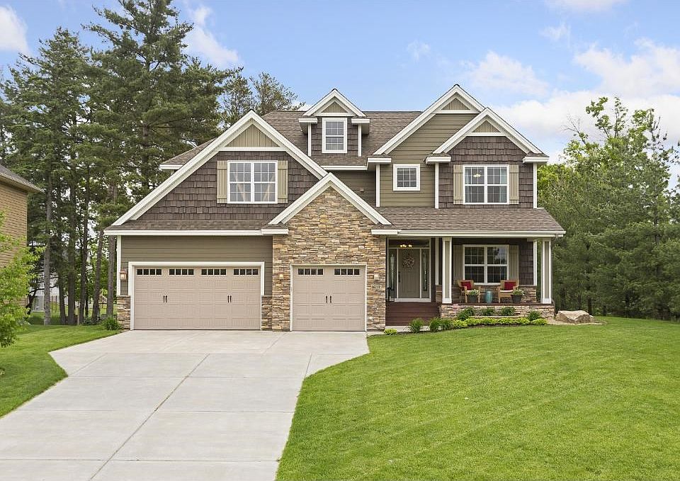 Great curb appeal with long concrete drive.