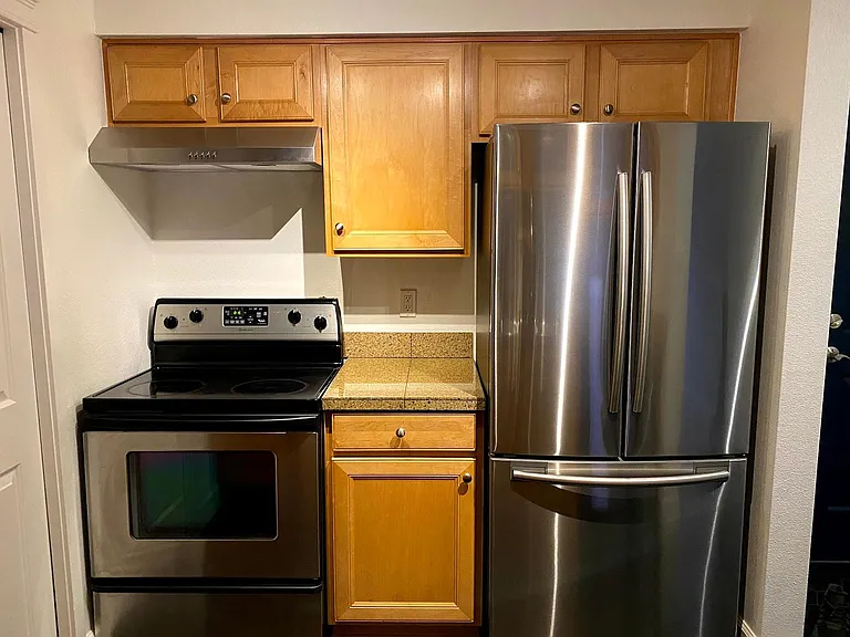 New 2020 refrigerator and hood over stove