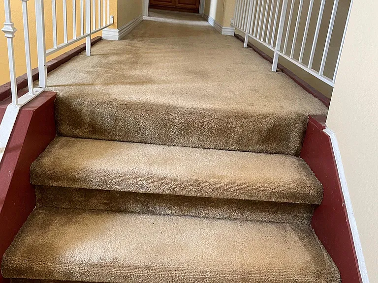 Going upstairs with long wide gorgeous hallway