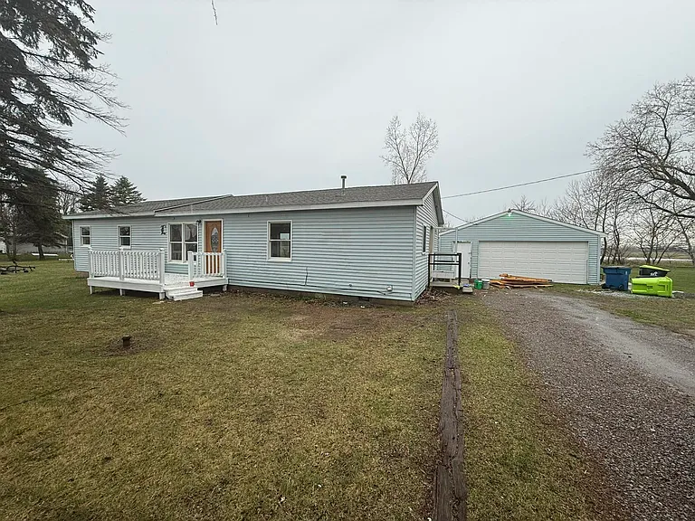 1442 Eleven Mile Rd — Photo 1