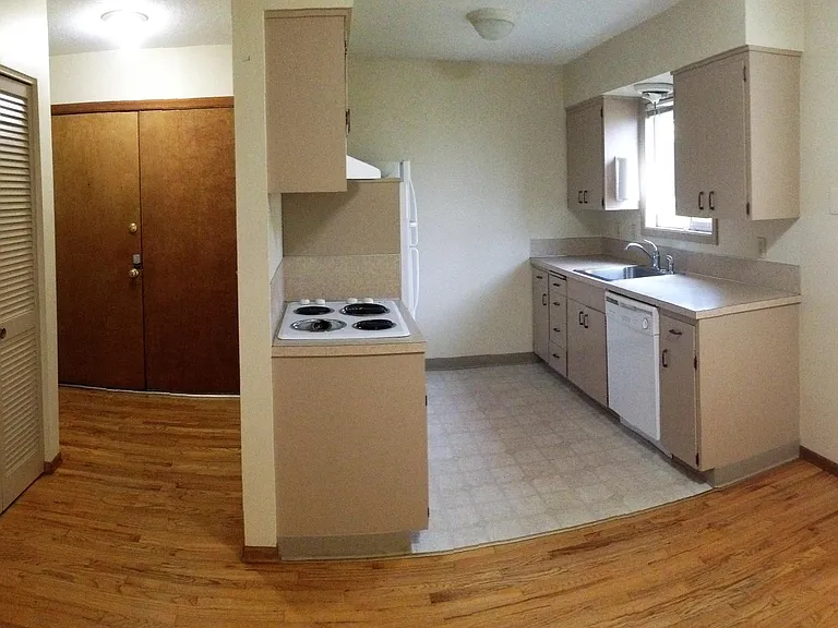 Hardwood entry and separate laundry room