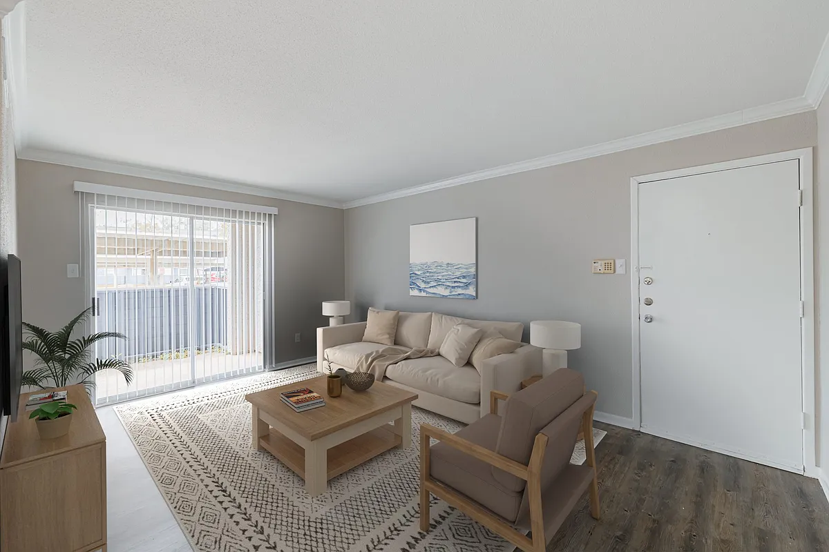 Living room and balcony - Oakgate at Pecan Grove