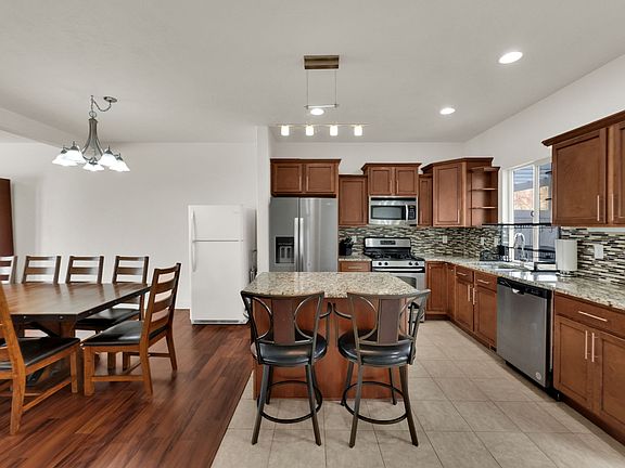 3rd image of 8935 S Quarry Stone Way E