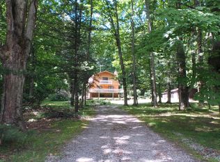 11739 Fisher Dr, Kewadin, MI 49648