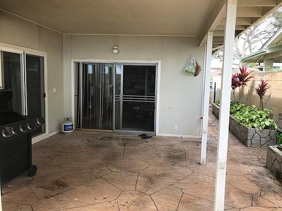 Covered back patio. Gas grill included.
