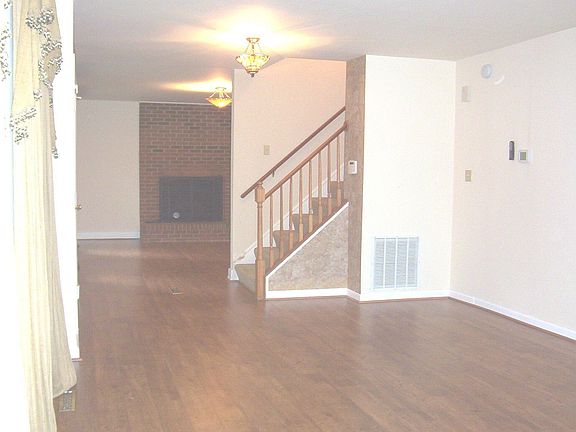 Huge living room with gleaming Pergo floors