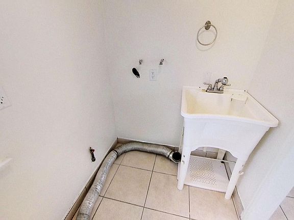 Laundry space equipped with water and gas hookups for your washer and dryer.