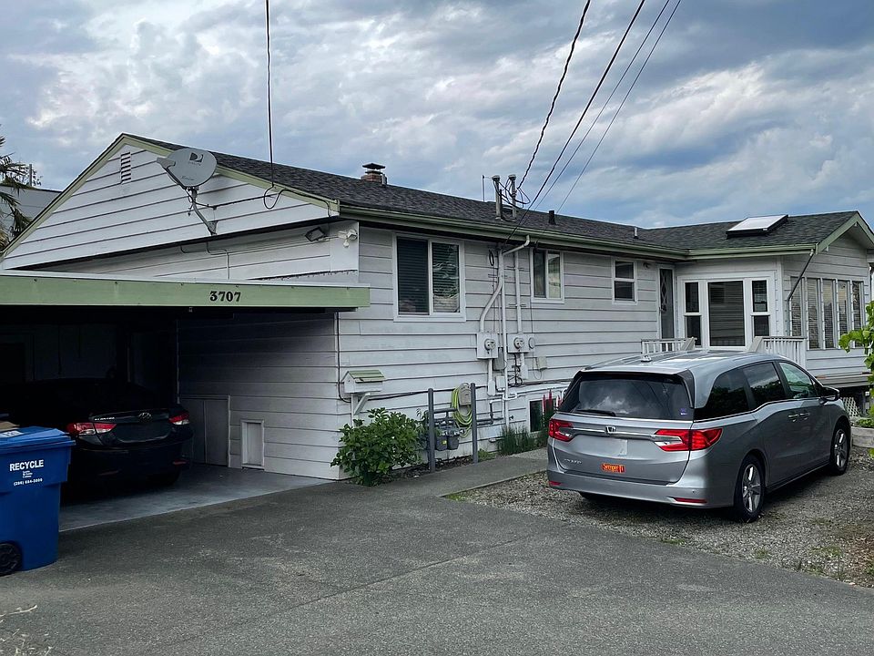 This shows the large carport which has a shop and laundry behind it. The parking pad with the van is large enough for a small RV.
