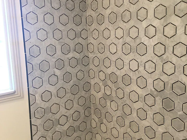 All new designer bathroom tub, fixtures and shower surround