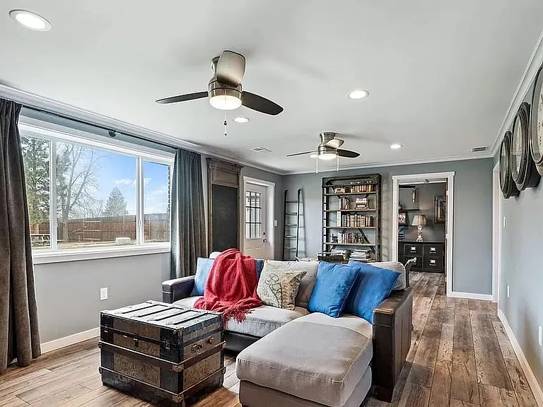 more of 2nd living area/family room. Office (or bedroom 3) can be glimpsed through door on far end