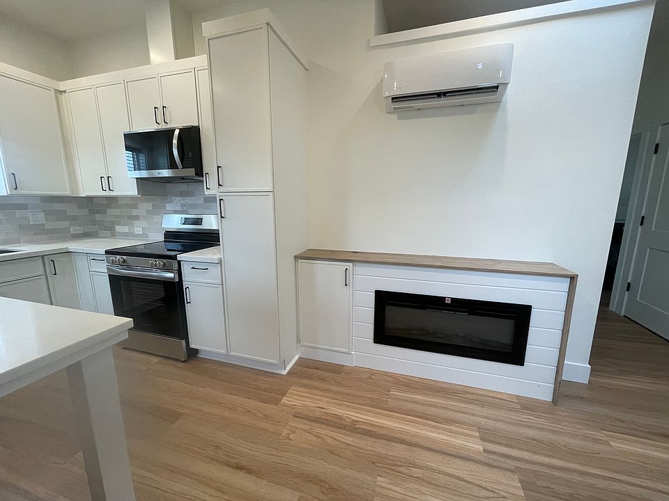 Large kitchen with full height double pantry cabinet storage