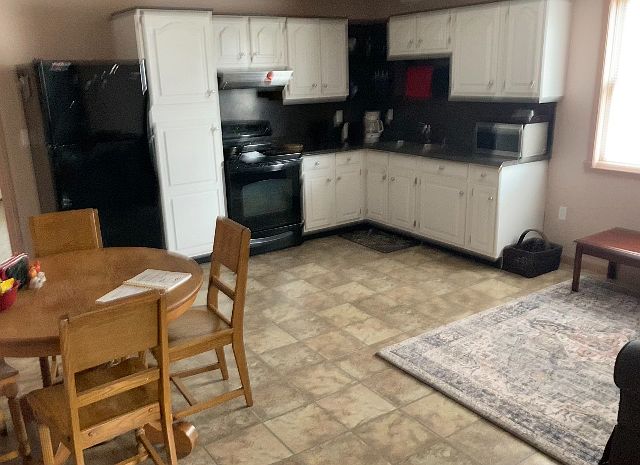 Kitchen Stove, fridge, microwave, coffee maker, plates, glasses, utensils etc.