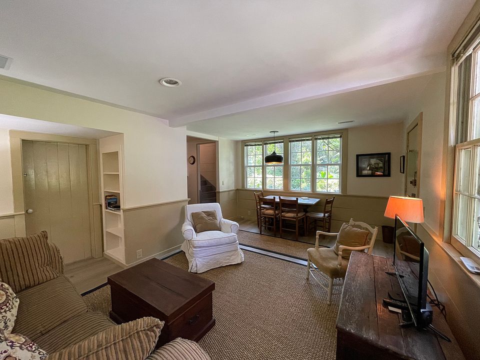 downstairs sitting room with large windows