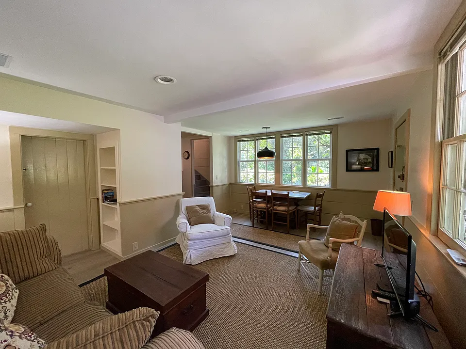 downstairs sitting room with large windows
