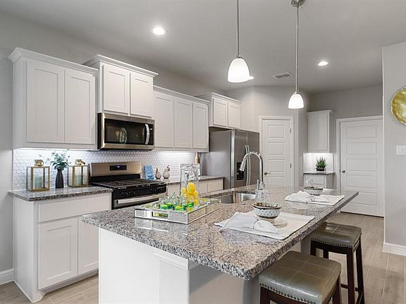 Kitchen - All Home and community information, including pricing, included features, terms, availability and amenities, are subject to change at any time without notice or obligation. All Drawings, pictures, photographs, video, square footages, floor plans, elevations, features, colors and sizes are approximate for illustration purposes only and will vary from the homes as built.