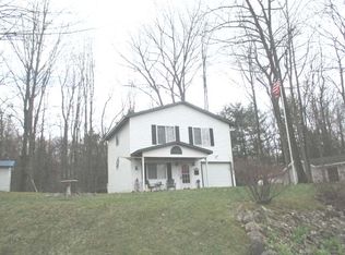 902 Pine St, Harrison, MI 48625