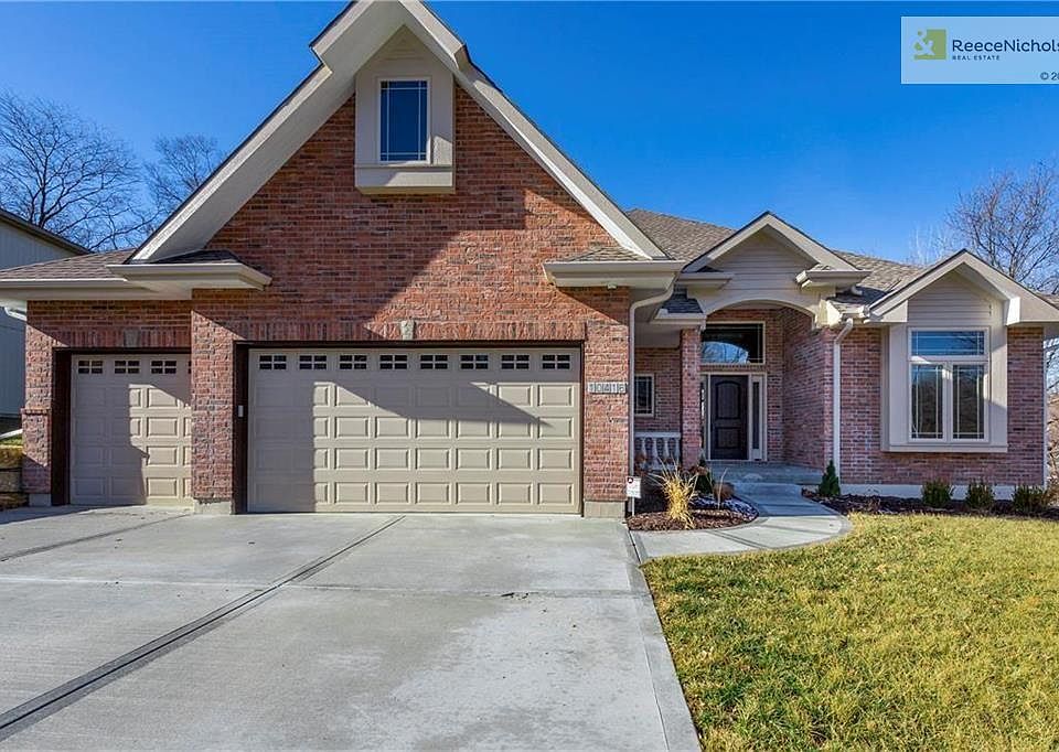 Brick Front, Flat Drive, Security System w/Cameras, Sprinkler System w/WiFi, Insulated Garage Doors, Treed Lot
