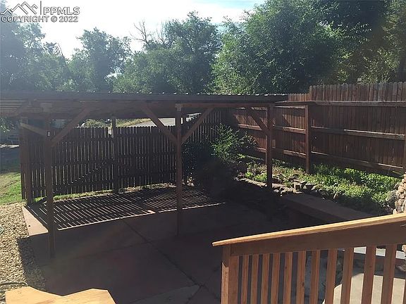 Awesome covered patio for enjoying the weather or hanging out around a fire