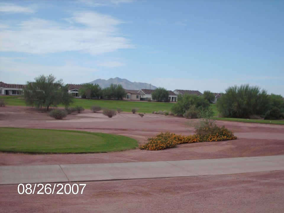 view from back patio of golf course and mountains