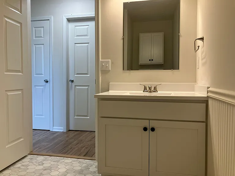 bathroom wit new sink & vanity