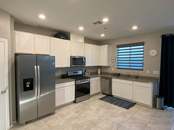 KITCHEN, WITH QUARTZ TOPS AND WALK IN PANTRY