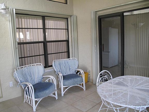 Newly enclosed patio with new windows an