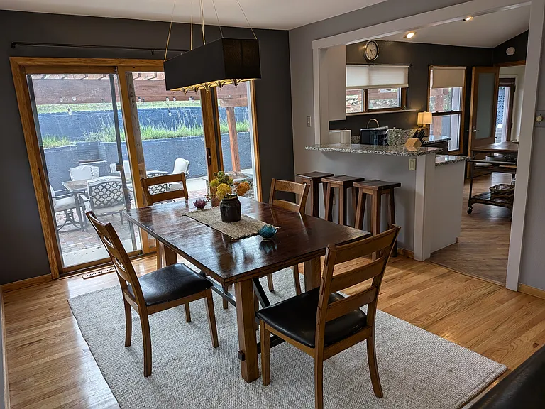 Dining Room is located next to Kitchen and patio