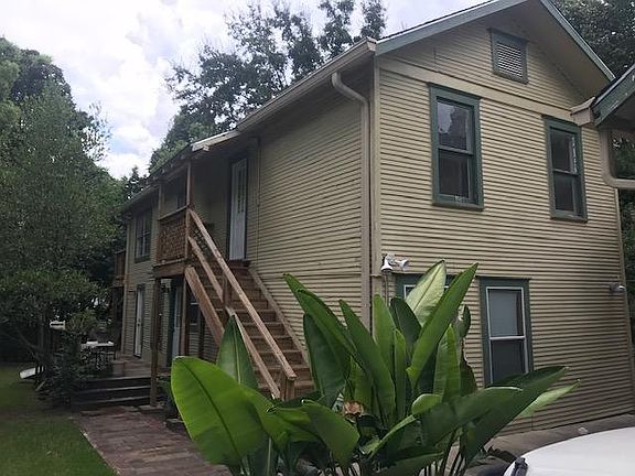 Lower apartment with deck at entry