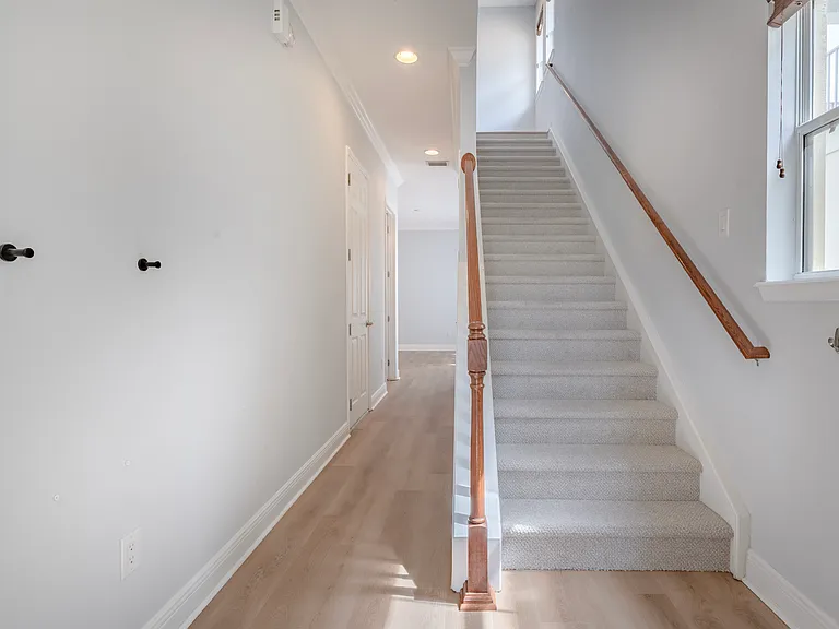 Head upstairs, where the bedrooms, Laundry room, and office space are located.