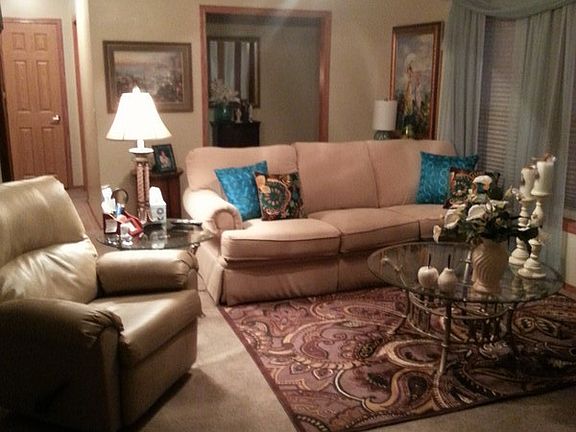 Large living room off front entry. : Spacious enough for sofas, chairs & huge TV. Nice windows. Cust
