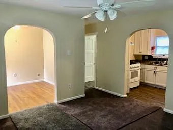 Living/Bedroom area looking to entry and kitchen area