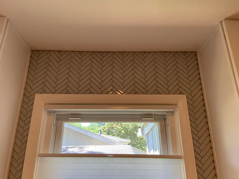 Kitchen window and the beautiful backsplash. You'll be happy to entertain family and friends.