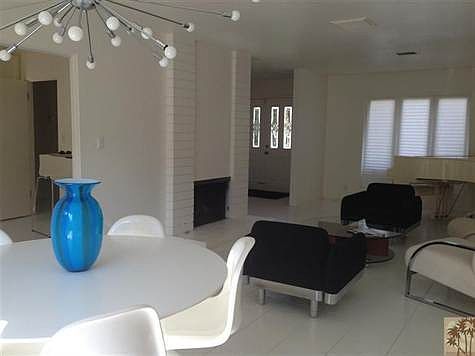 Dining area, fireplace and living room